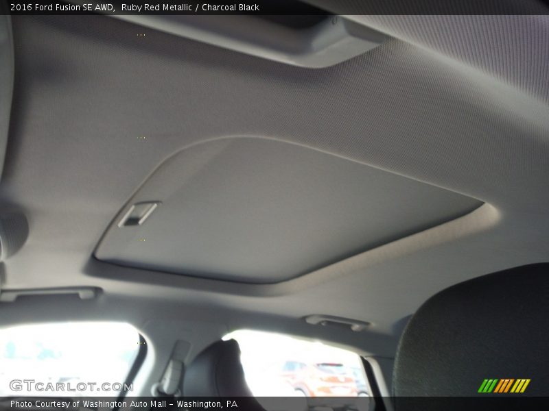 Ruby Red Metallic / Charcoal Black 2016 Ford Fusion SE AWD