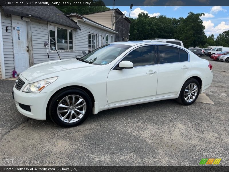 Ivory Pearl / Stone Gray 2007 Infiniti G 35 x Sedan