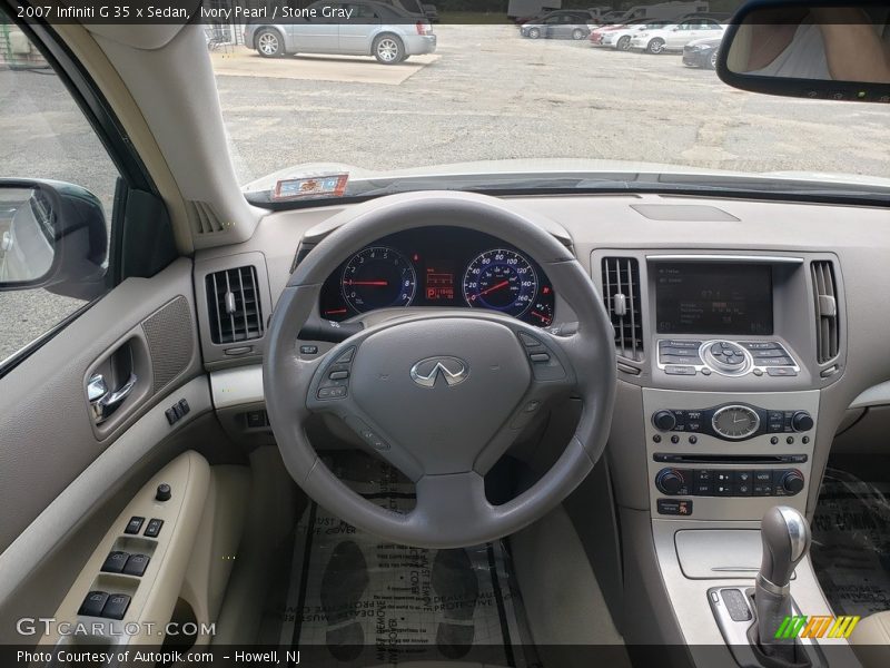 Ivory Pearl / Stone Gray 2007 Infiniti G 35 x Sedan