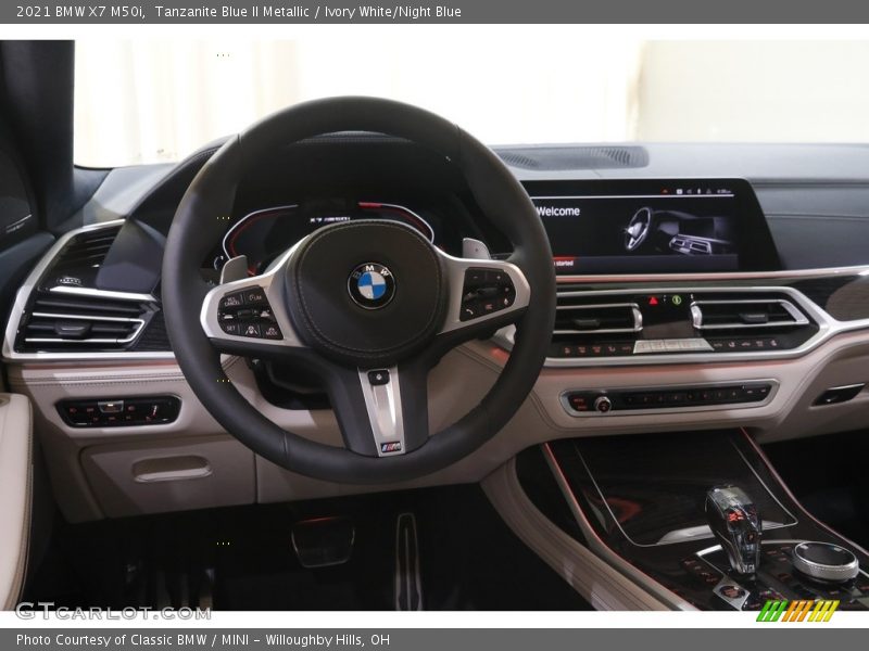Tanzanite Blue II Metallic / Ivory White/Night Blue 2021 BMW X7 M50i