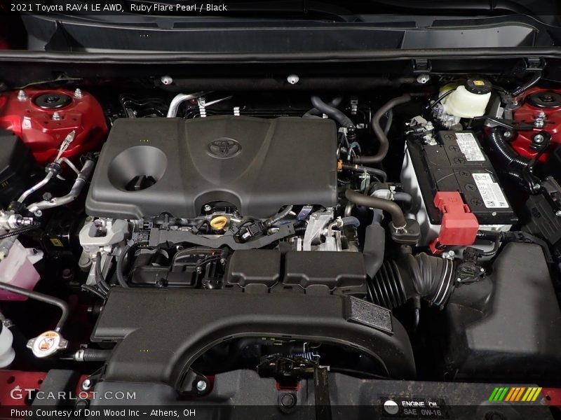 Ruby Flare Pearl / Black 2021 Toyota RAV4 LE AWD