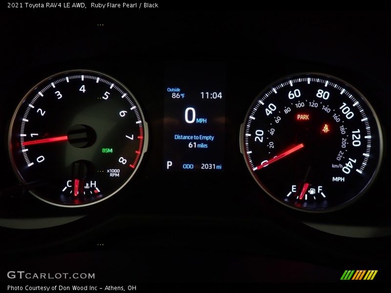 Ruby Flare Pearl / Black 2021 Toyota RAV4 LE AWD