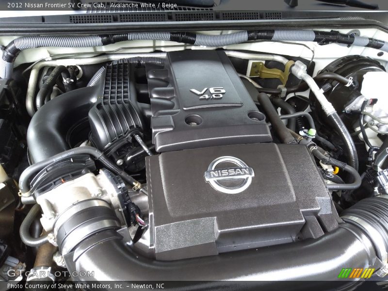 Avalanche White / Beige 2012 Nissan Frontier SV Crew Cab