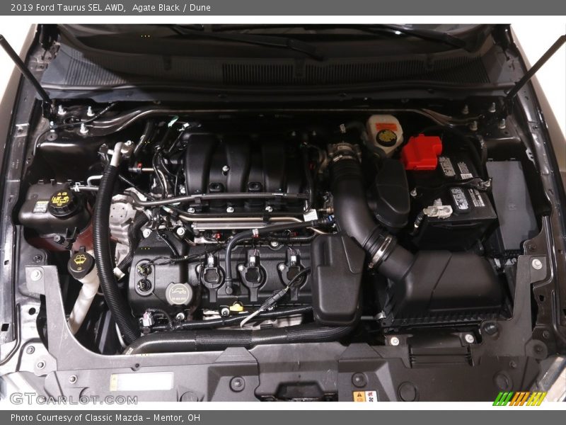 Agate Black / Dune 2019 Ford Taurus SEL AWD
