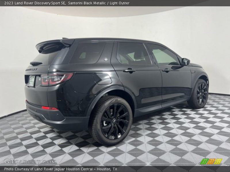 Santorini Black Metallic / Light Oyster 2023 Land Rover Discovery Sport SE