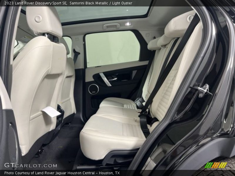 Santorini Black Metallic / Light Oyster 2023 Land Rover Discovery Sport SE