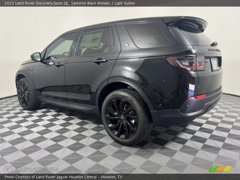 Santorini Black Metallic / Light Oyster 2023 Land Rover Discovery Sport SE