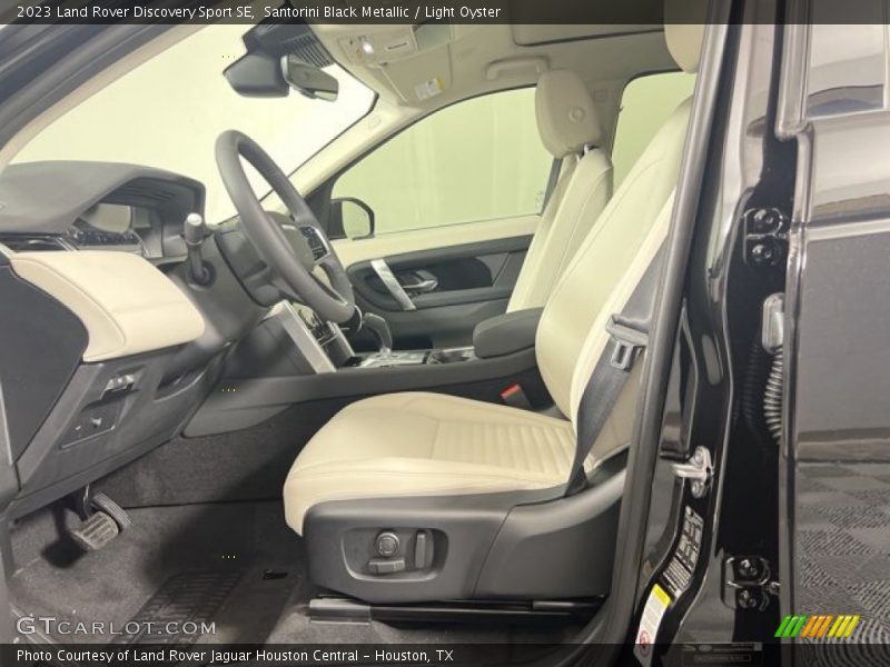 Santorini Black Metallic / Light Oyster 2023 Land Rover Discovery Sport SE