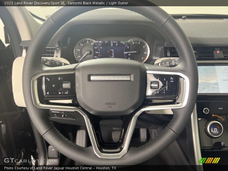 Santorini Black Metallic / Light Oyster 2023 Land Rover Discovery Sport SE