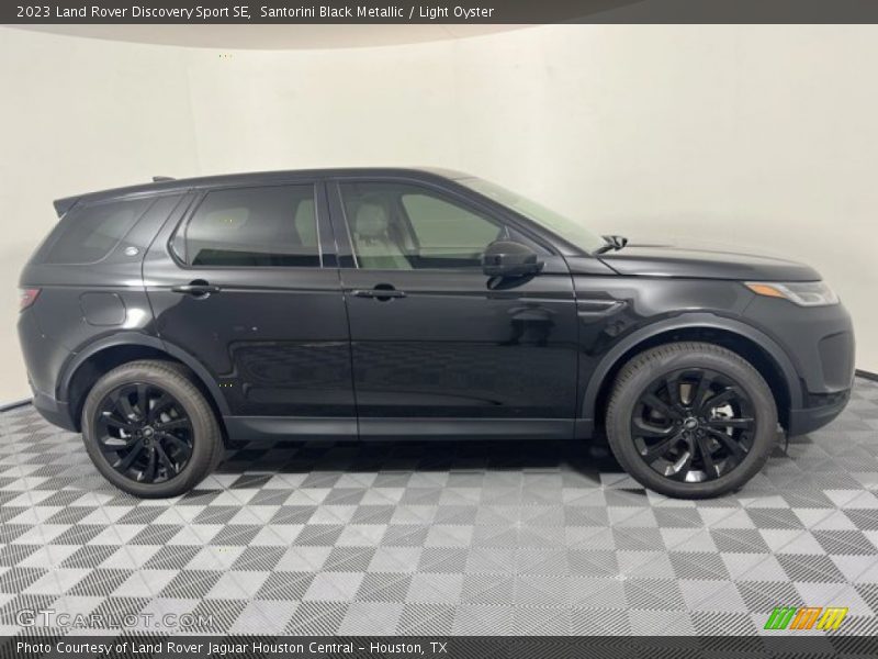 Santorini Black Metallic / Light Oyster 2023 Land Rover Discovery Sport SE