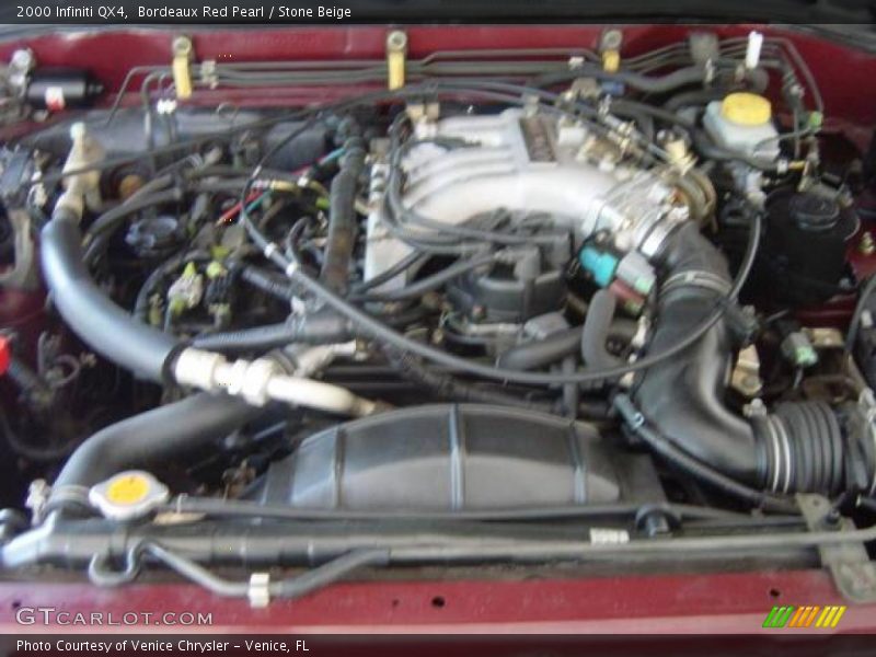 Bordeaux Red Pearl / Stone Beige 2000 Infiniti QX4