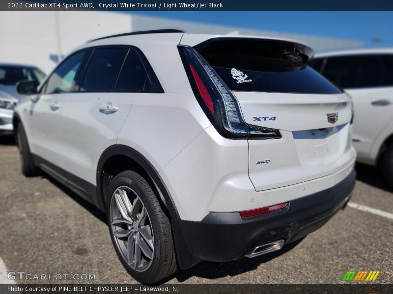 Crystal White Tricoat / Light Wheat/Jet Black 2022 Cadillac XT4 Sport AWD