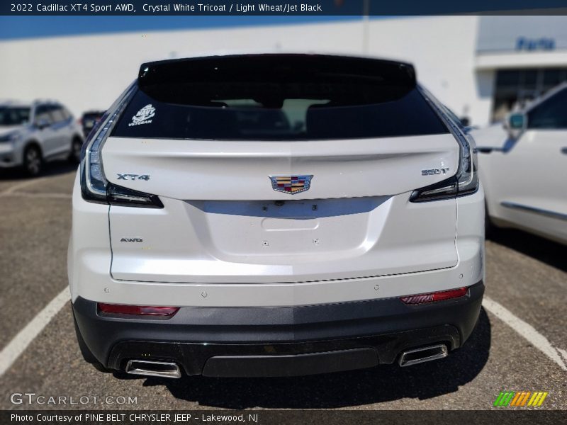 Crystal White Tricoat / Light Wheat/Jet Black 2022 Cadillac XT4 Sport AWD