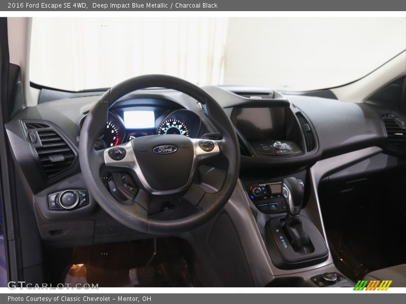 Deep Impact Blue Metallic / Charcoal Black 2016 Ford Escape SE 4WD