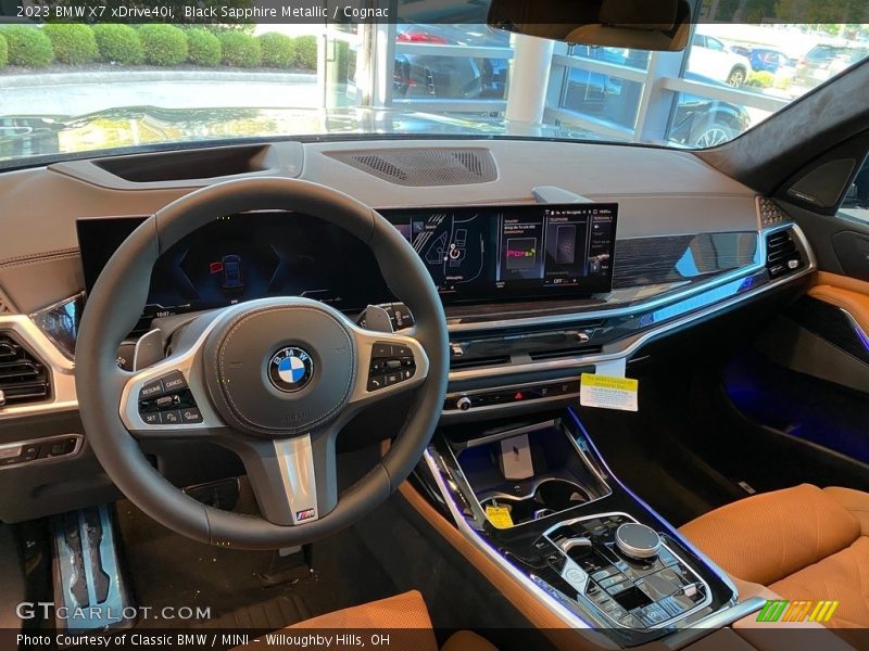 Black Sapphire Metallic / Cognac 2023 BMW X7 xDrive40i