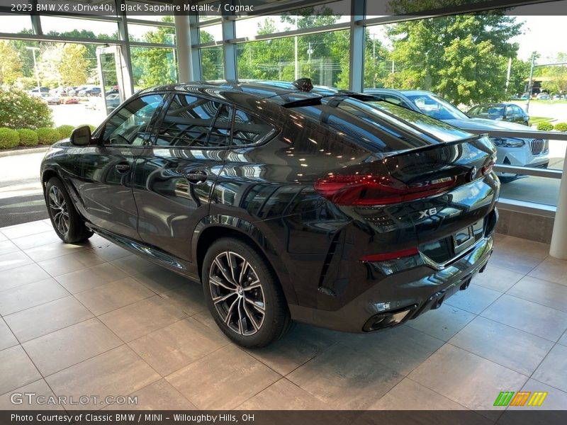 Black Sapphire Metallic / Cognac 2023 BMW X6 xDrive40i