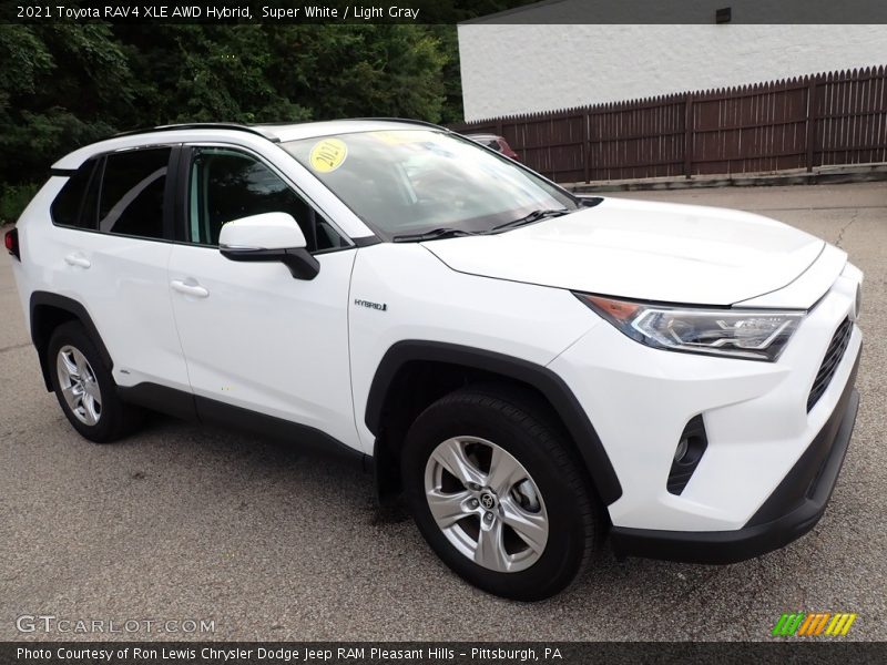 Front 3/4 View of 2021 RAV4 XLE AWD Hybrid