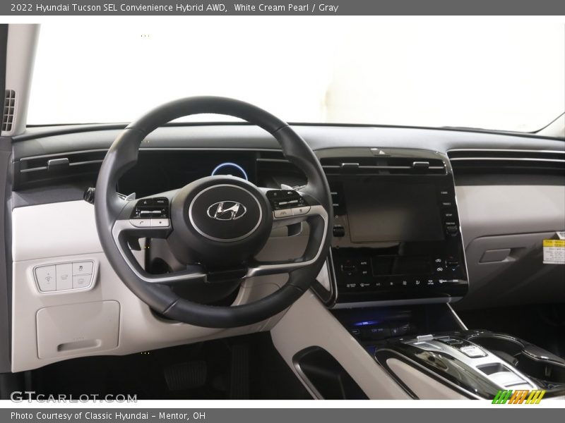 White Cream Pearl / Gray 2022 Hyundai Tucson SEL Convienience Hybrid AWD