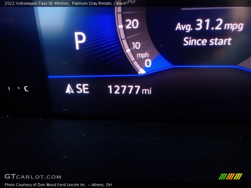 Platinum Gray Metallic / Black 2022 Volkswagen Taos SE 4Motion