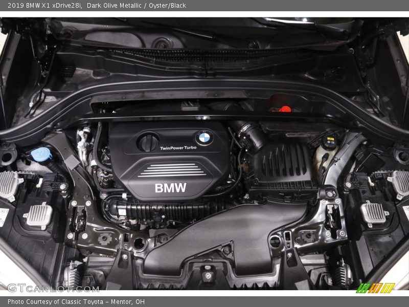Dark Olive Metallic / Oyster/Black 2019 BMW X1 xDrive28i