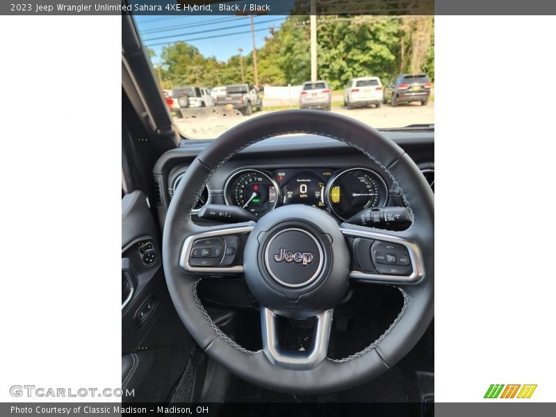 Black / Black 2023 Jeep Wrangler Unlimited Sahara 4XE Hybrid