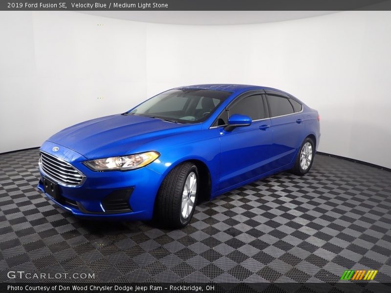 Velocity Blue / Medium Light Stone 2019 Ford Fusion SE