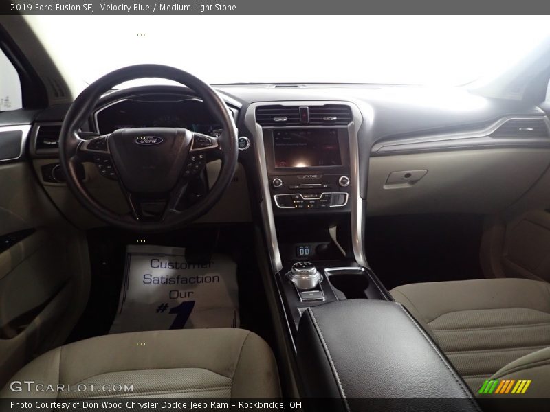 Velocity Blue / Medium Light Stone 2019 Ford Fusion SE
