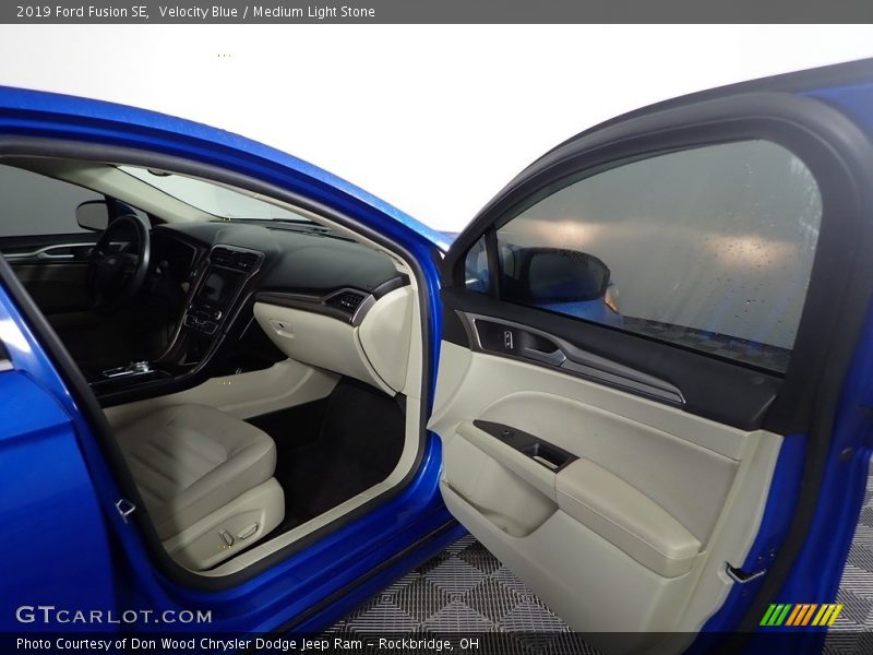 Velocity Blue / Medium Light Stone 2019 Ford Fusion SE
