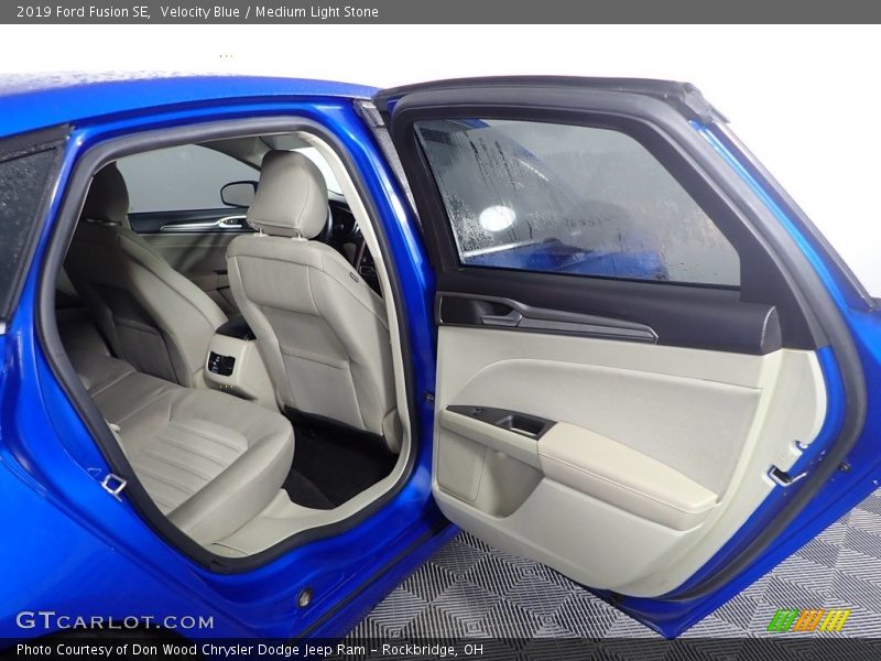 Velocity Blue / Medium Light Stone 2019 Ford Fusion SE