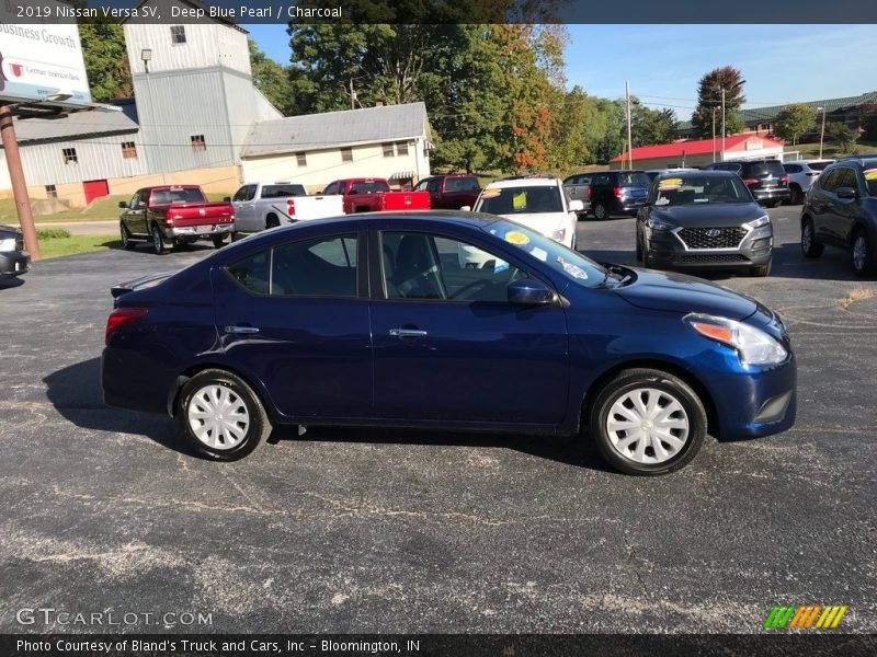 Deep Blue Pearl / Charcoal 2019 Nissan Versa SV