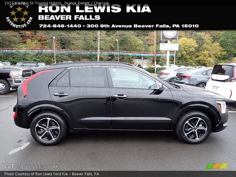 Orange Delight / Charcoal 2023 Kia Niro SX Touring Hybrid