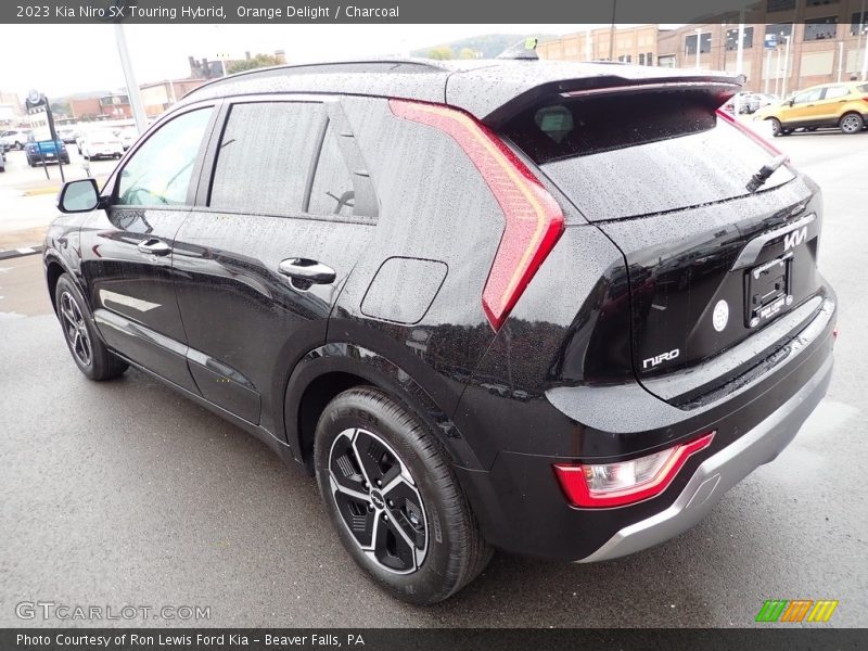 Orange Delight / Charcoal 2023 Kia Niro SX Touring Hybrid