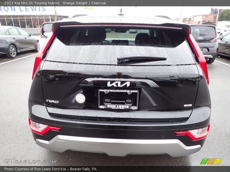 Orange Delight / Charcoal 2023 Kia Niro SX Touring Hybrid