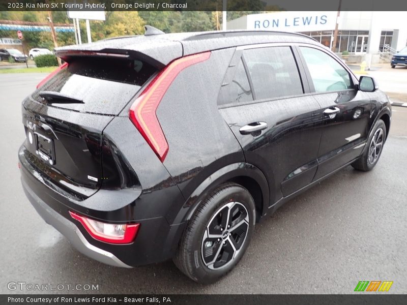 Orange Delight / Charcoal 2023 Kia Niro SX Touring Hybrid
