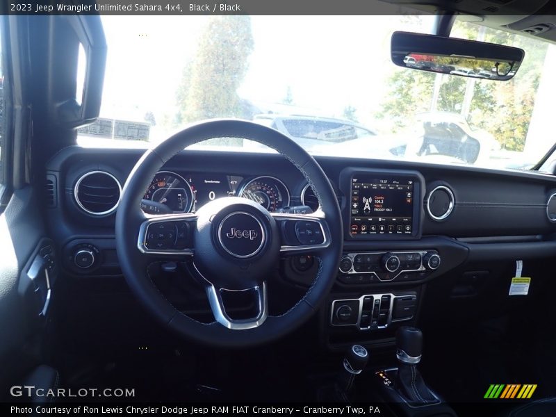 Black / Black 2023 Jeep Wrangler Unlimited Sahara 4x4