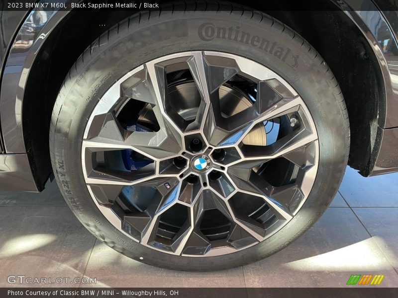 Black Sapphire Metallic / Black 2023 BMW X7 M60i