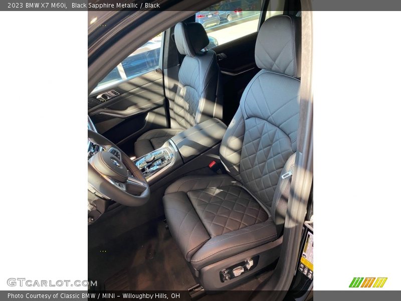 Black Sapphire Metallic / Black 2023 BMW X7 M60i
