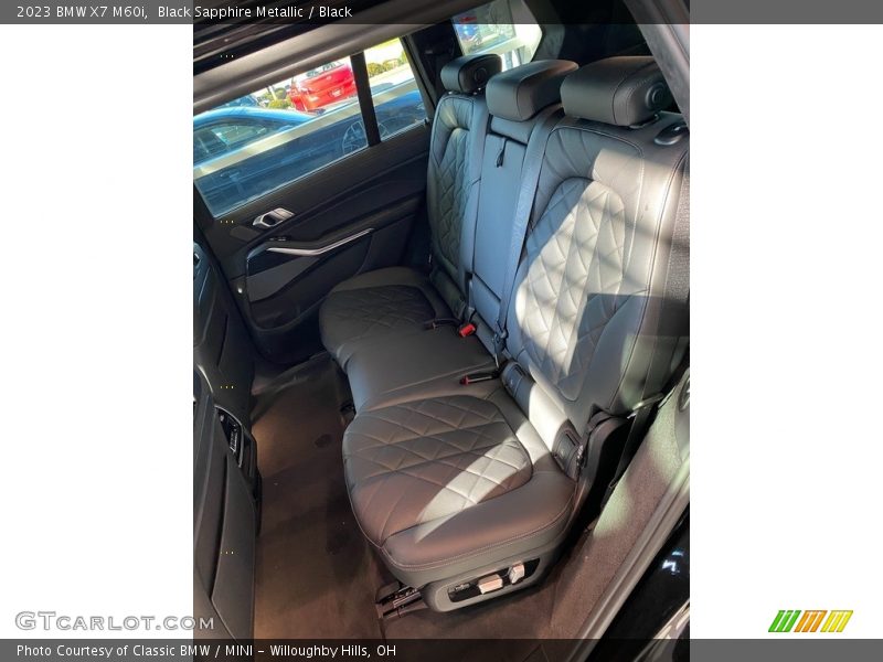 Black Sapphire Metallic / Black 2023 BMW X7 M60i