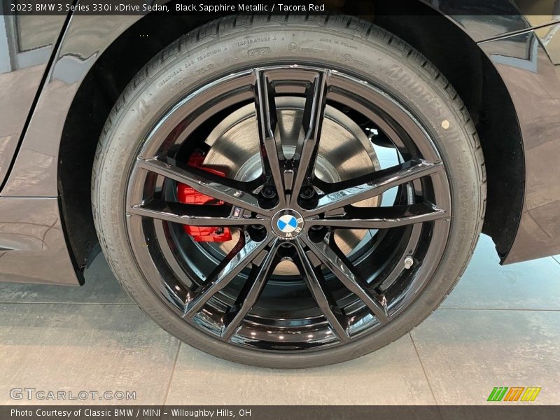 Black Sapphire Metallic / Tacora Red 2023 BMW 3 Series 330i xDrive Sedan