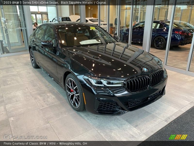 Black Sapphire Metallic / Cognac 2023 BMW 5 Series 540i xDrive Sedan