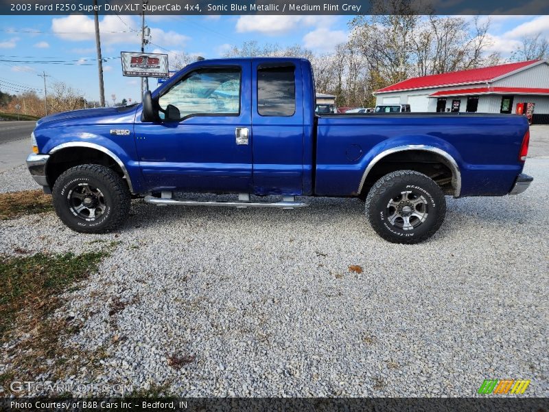 Sonic Blue Metallic / Medium Flint Grey 2003 Ford F250 Super Duty XLT SuperCab 4x4