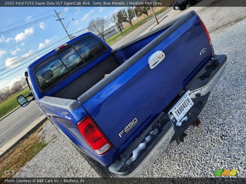 Sonic Blue Metallic / Medium Flint Grey 2003 Ford F250 Super Duty XLT SuperCab 4x4