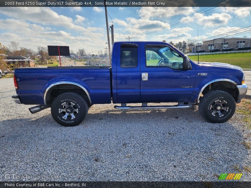 Sonic Blue Metallic / Medium Flint Grey 2003 Ford F250 Super Duty XLT SuperCab 4x4