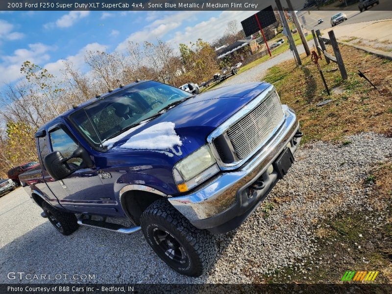 Sonic Blue Metallic / Medium Flint Grey 2003 Ford F250 Super Duty XLT SuperCab 4x4