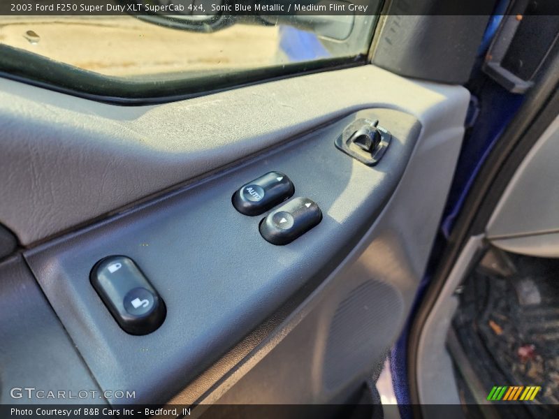 Sonic Blue Metallic / Medium Flint Grey 2003 Ford F250 Super Duty XLT SuperCab 4x4
