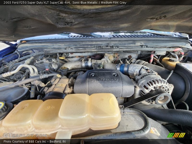 Sonic Blue Metallic / Medium Flint Grey 2003 Ford F250 Super Duty XLT SuperCab 4x4