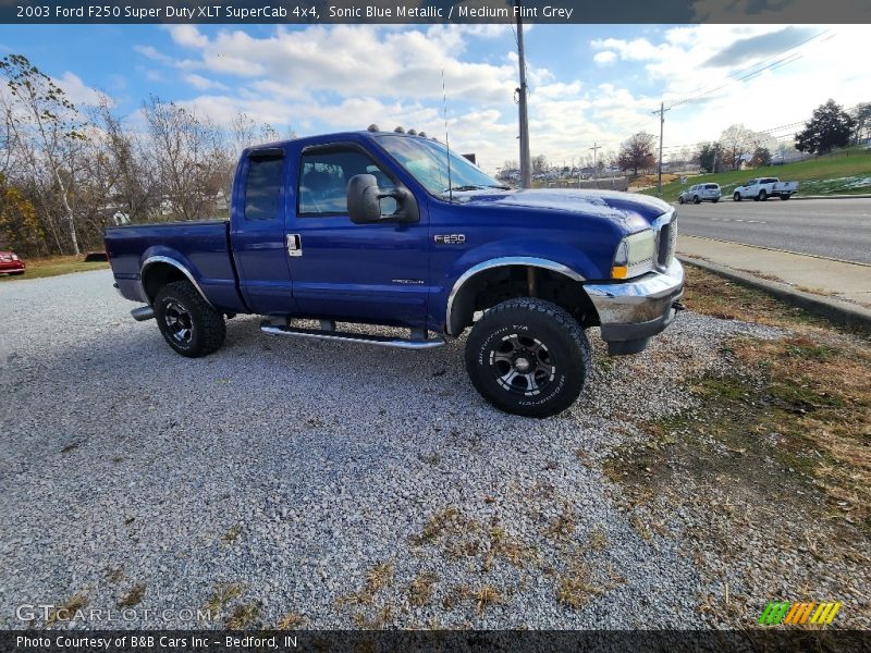 Sonic Blue Metallic / Medium Flint Grey 2003 Ford F250 Super Duty XLT SuperCab 4x4