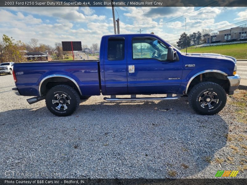 Sonic Blue Metallic / Medium Flint Grey 2003 Ford F250 Super Duty XLT SuperCab 4x4