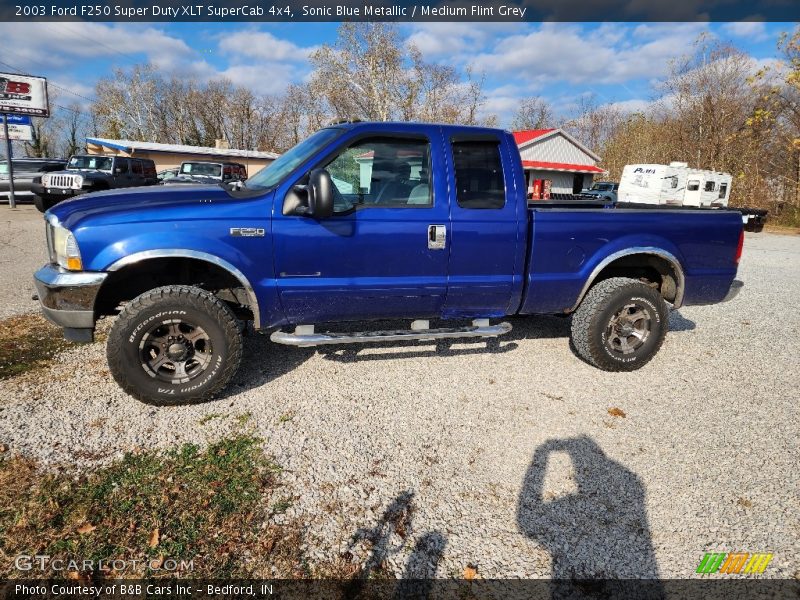 Sonic Blue Metallic / Medium Flint Grey 2003 Ford F250 Super Duty XLT SuperCab 4x4