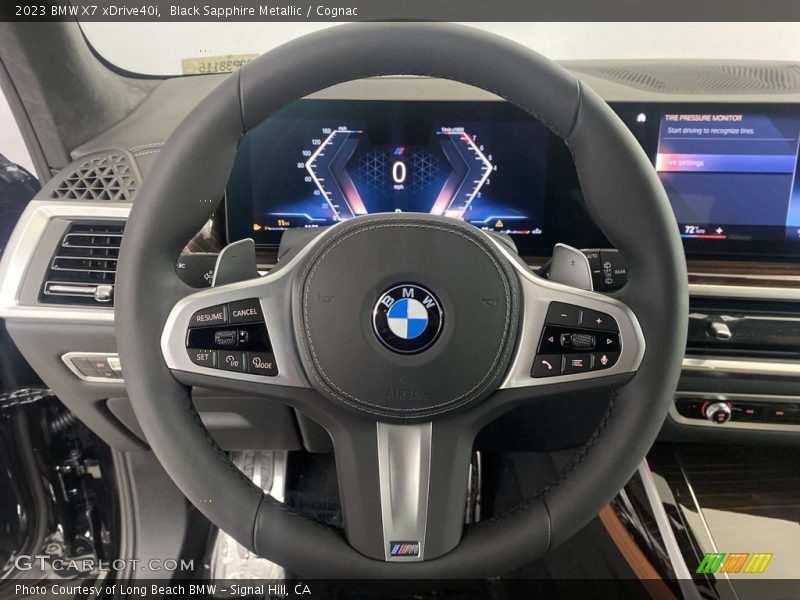 Black Sapphire Metallic / Cognac 2023 BMW X7 xDrive40i